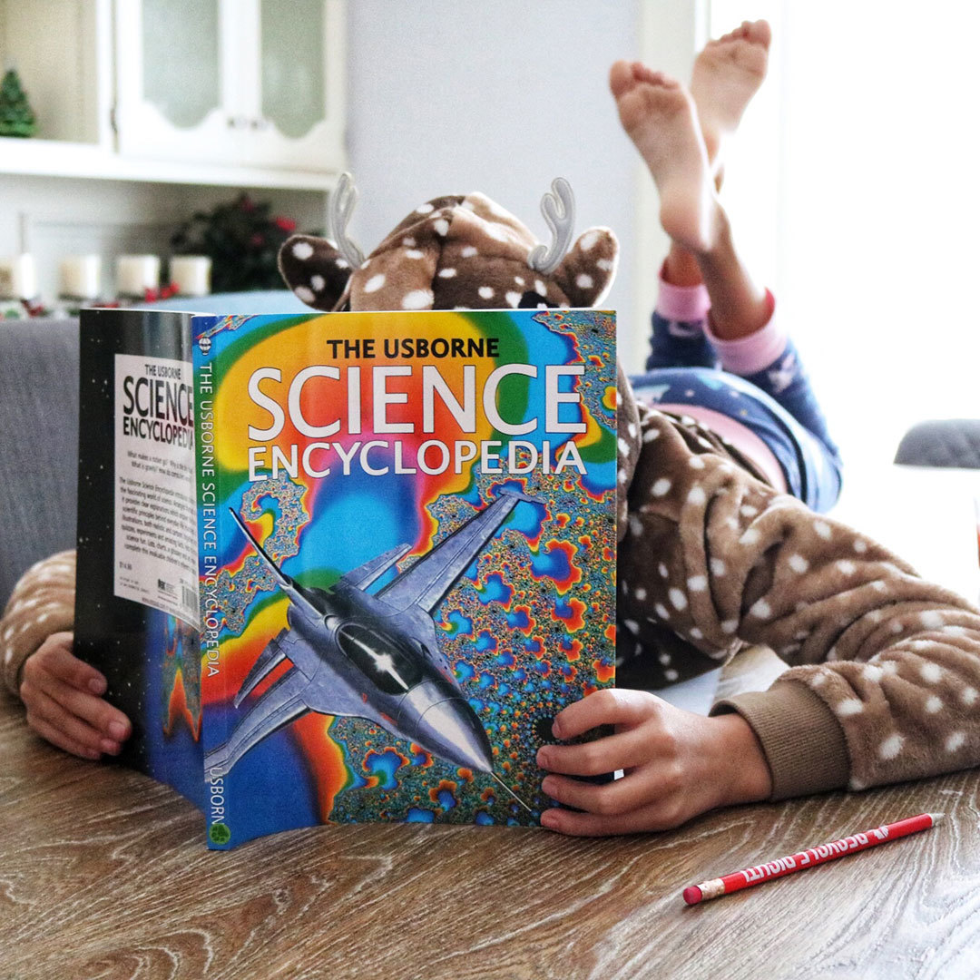 reading-science Girl reading her Science curriculum